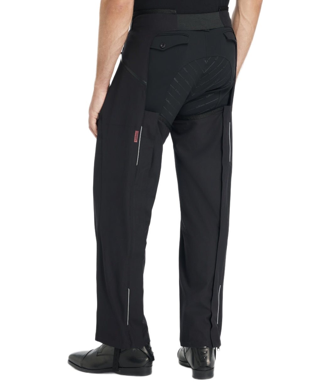 Black coloured LeMieux Mens Stormwear Waterproof Chaps on white background