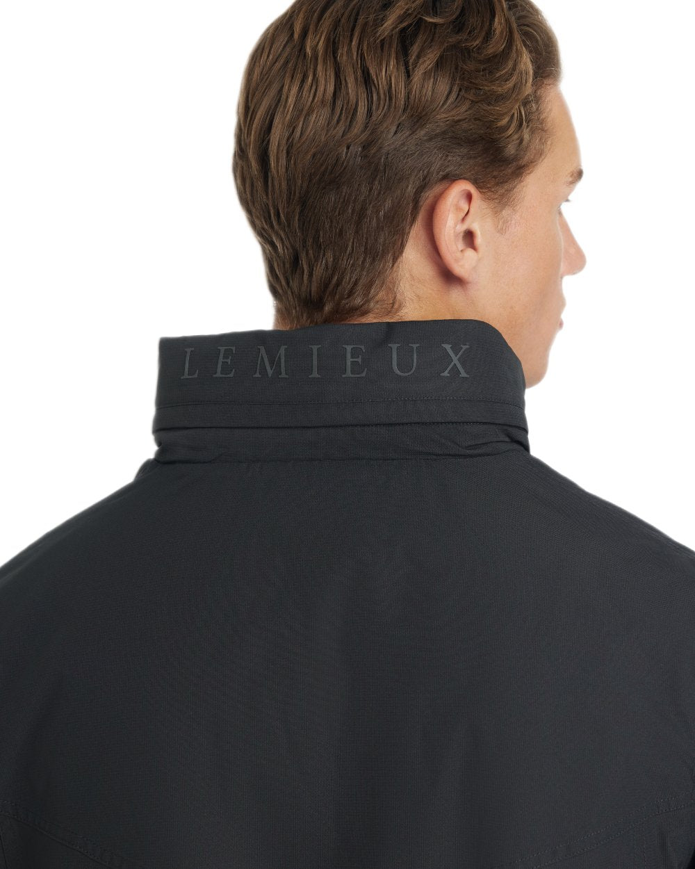Black coloured LeMieux Mens Waterproof Team Jacket on white background
