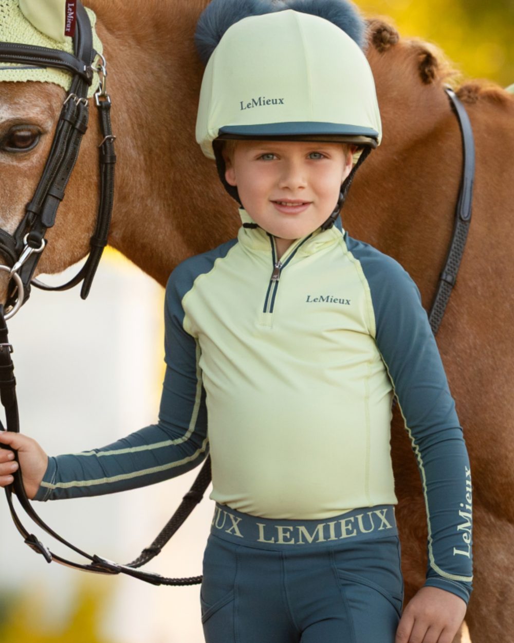 Macaron coloured LeMieux Mini Base Layer on outdoor background