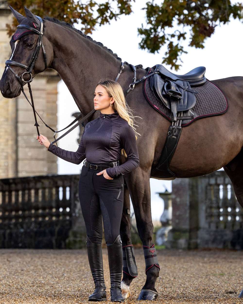 Cinder coloured LeMieux Suede Close Contact Squares on yard background