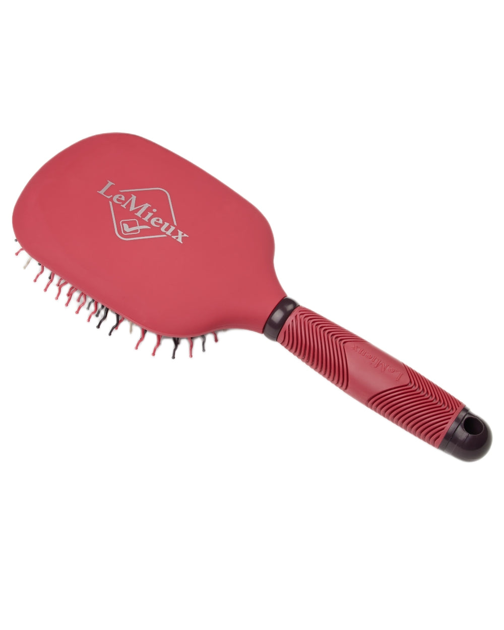 Cranberry coloured LeMieux Tangle Tidy Brush on white background
