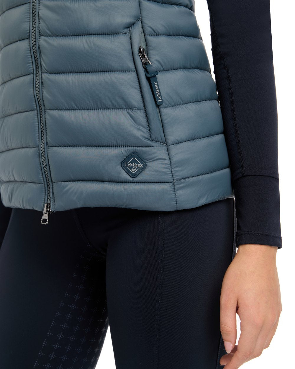 Petrol coloured LeMieux Tilly Hooded Puffer Gilet on white background