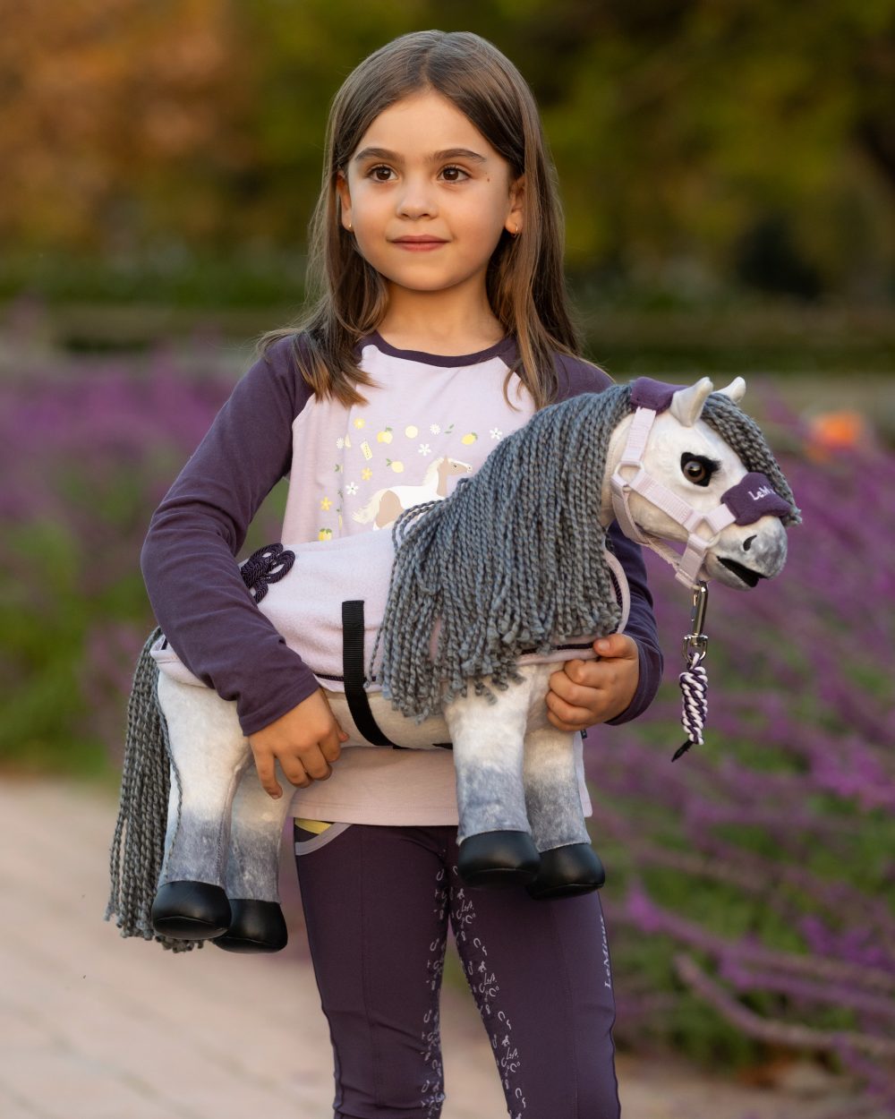 Blanca coloured LeMieux Toy Pony Blanca on garden background