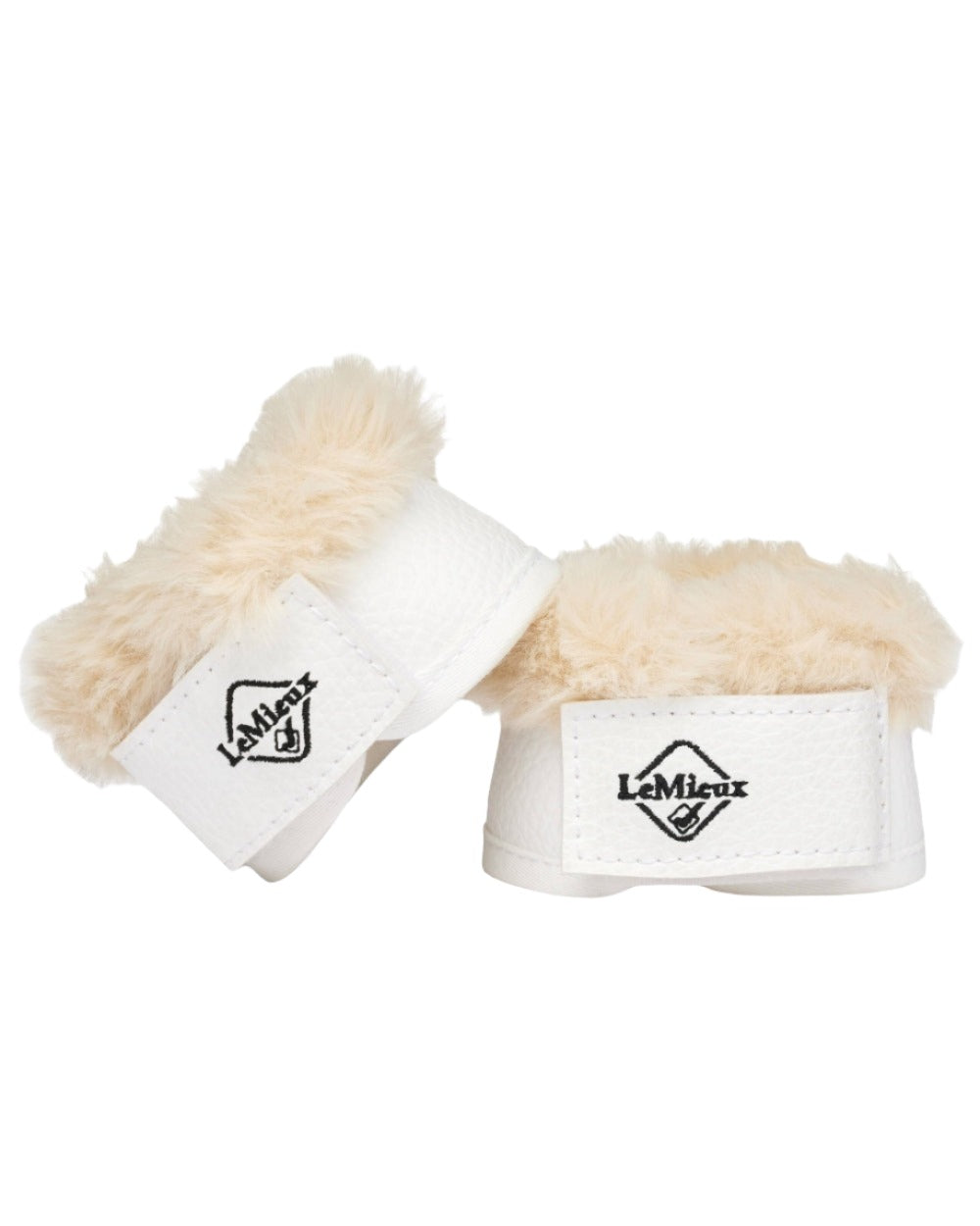 White coloured LeMieux Toy Pony Dressage Over Reach Boot on grey background
