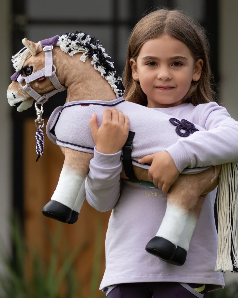 Oskar coloured LeMieux Toy Pony Oskar on outdoor background