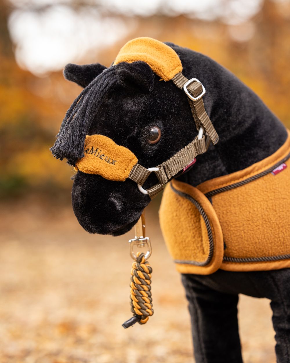 Alpine coloured LeMieux Toy Pony Vogue Headcollar on blurry background