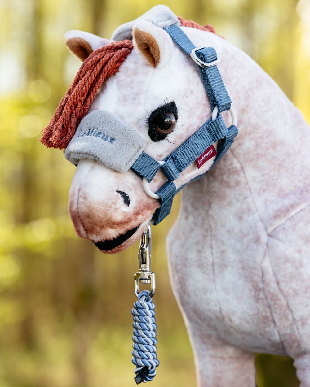 Ice Blue coloured LeMieux Toy Pony Vogue Headcollar on blurry background