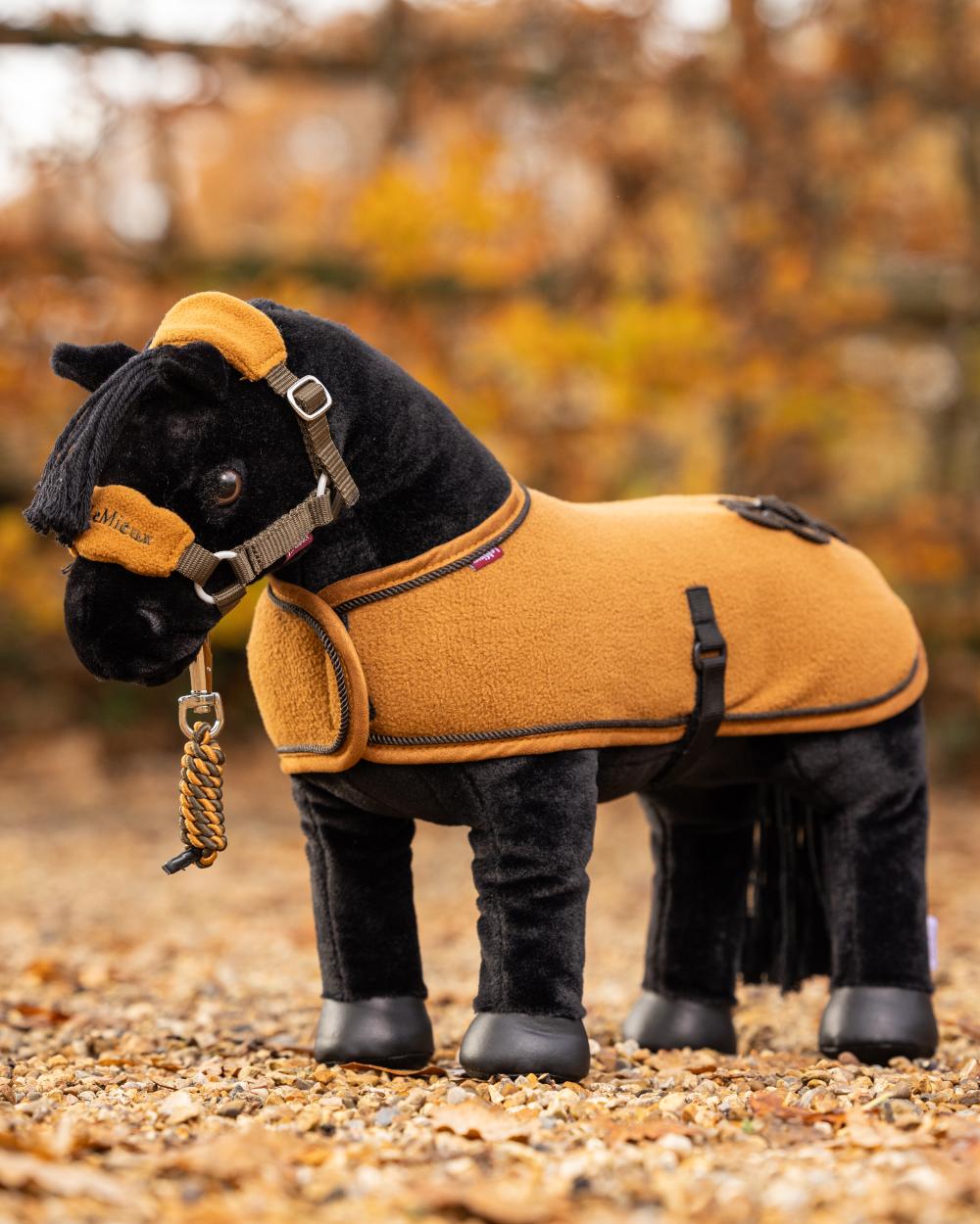 Alpine coloured LeMieux Toy Pony Vogue Headcollar on blurry background