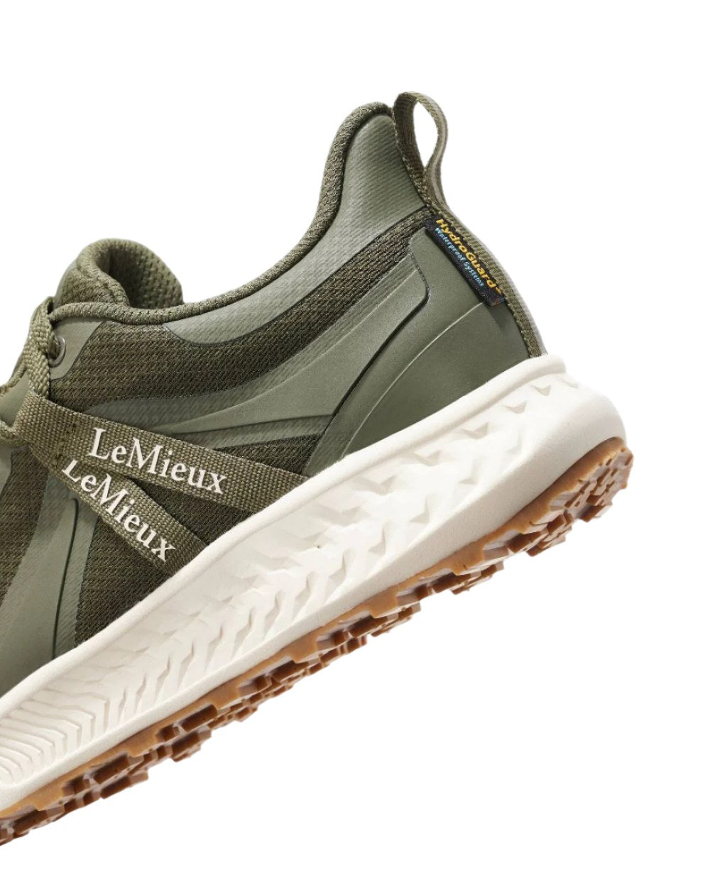 Khaki coloured LeMieux Trax Waterproof Trainers on white background