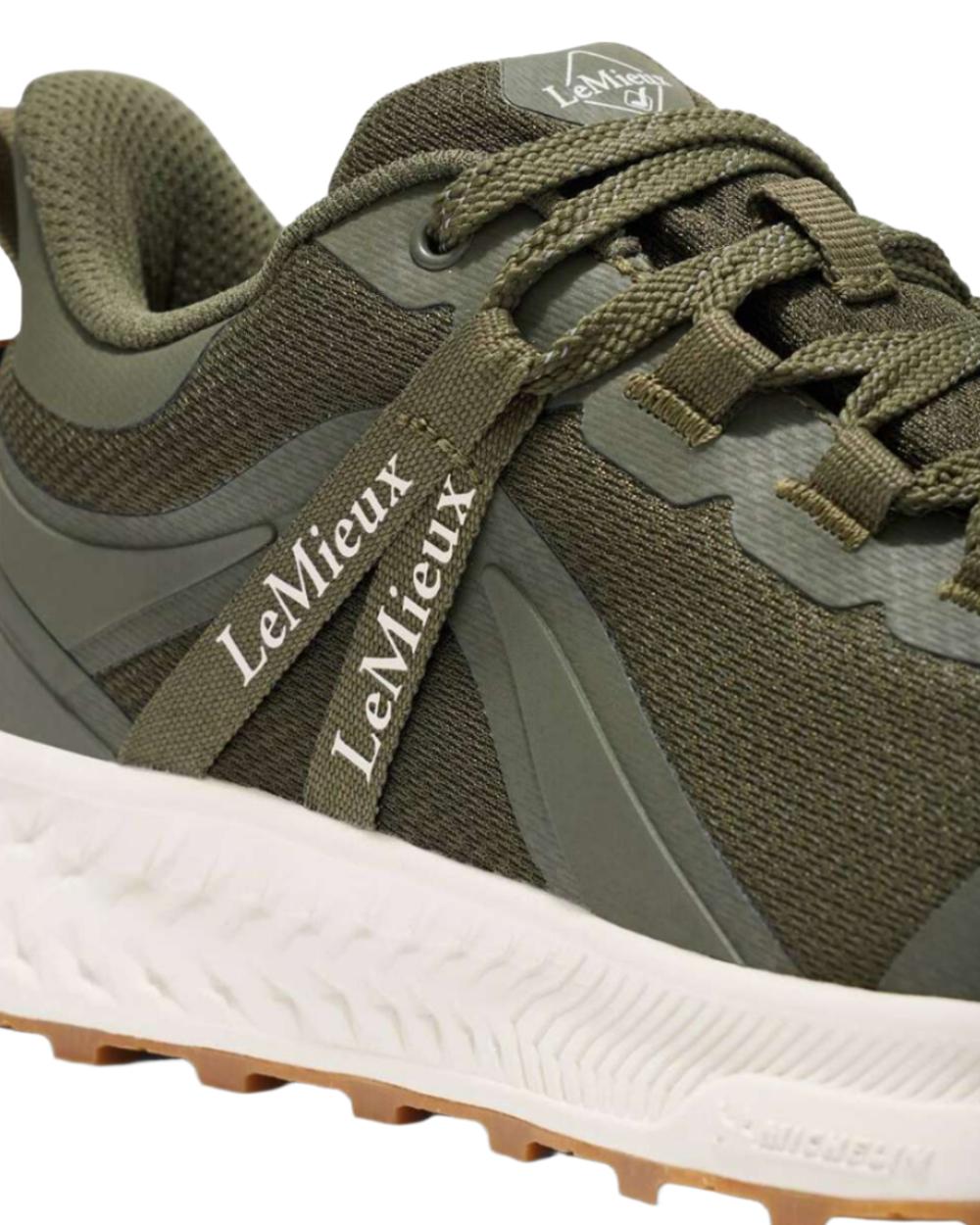 Khaki coloured LeMieux Trax Waterproof Trainers on white background