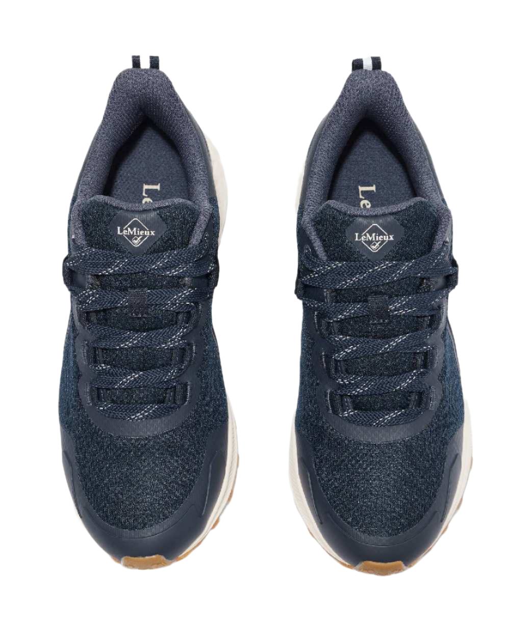 Navy coloured LeMieux Trax Waterproof Trainers on white background