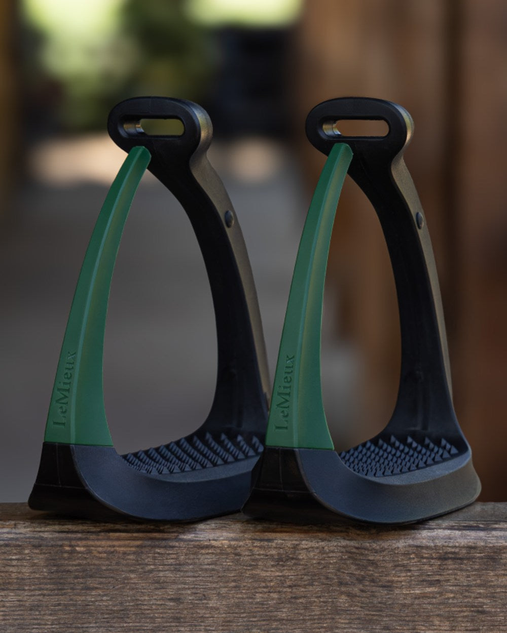 Hunter Green coloured LeMieux VectorFlex Stirrup Arm on outdoor background