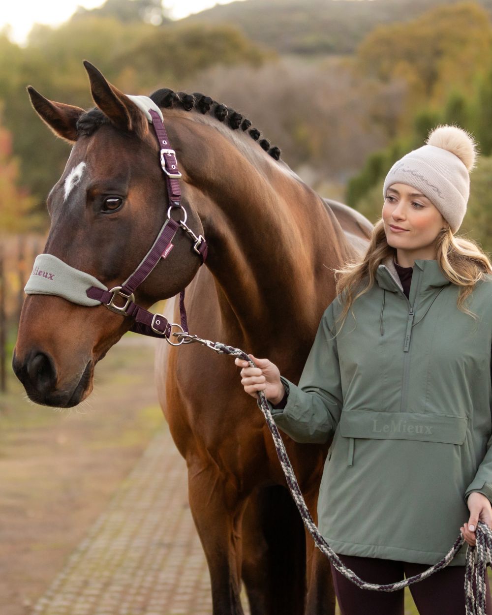Damson coloured LeMieux Vogue Headcollar & Leadrope on outdoor background