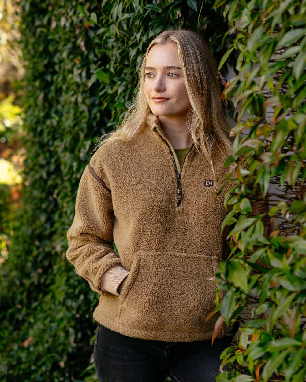 Caramel Coloured LeMieux Womens Avery Teddy Quarter Zip Fleece on Outdoor Trees Background