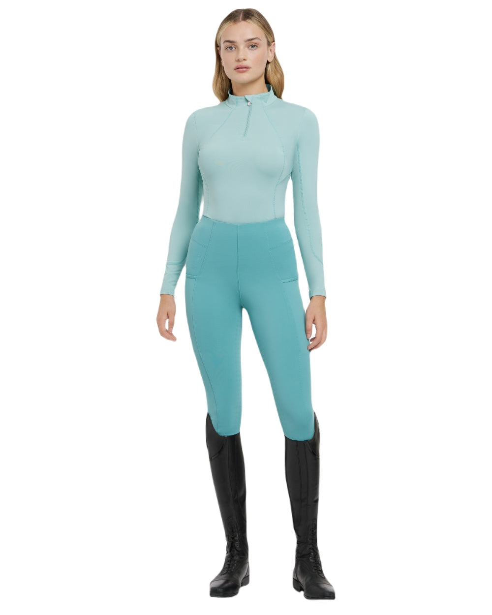 Aqua coloured LeMieux Womens Base Layer on white background