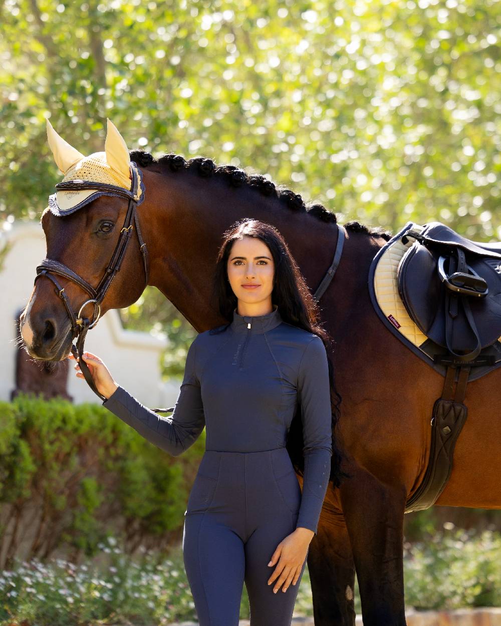 Dusk Blue coloured LeMieux Womens Base Layer on backyard background