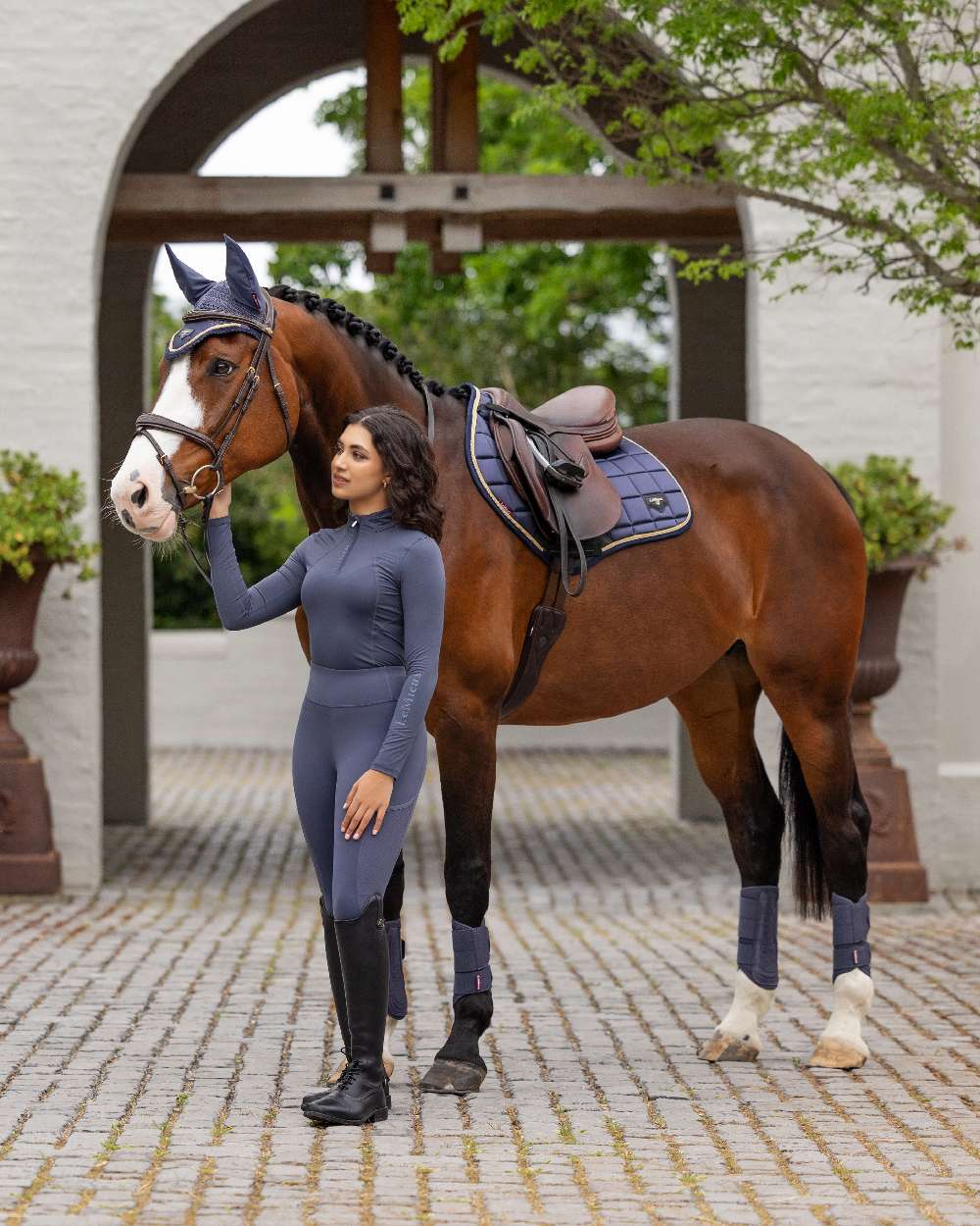 Dusk Blue coloured LeMieux Womens Base Layer on street background