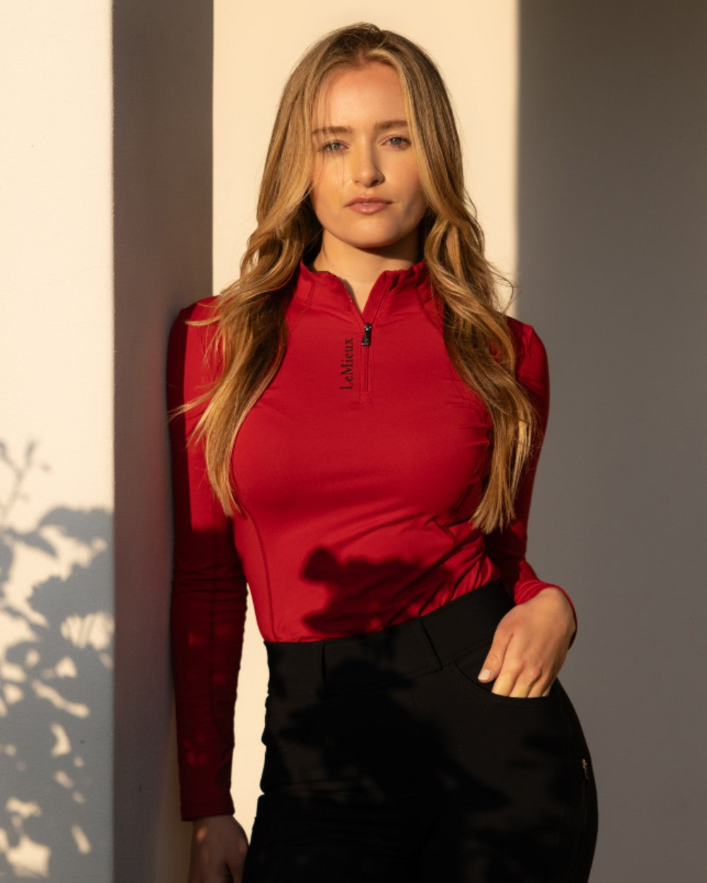 Chilli coloured LeMieux Womens Classique Base Layer on outdoor background