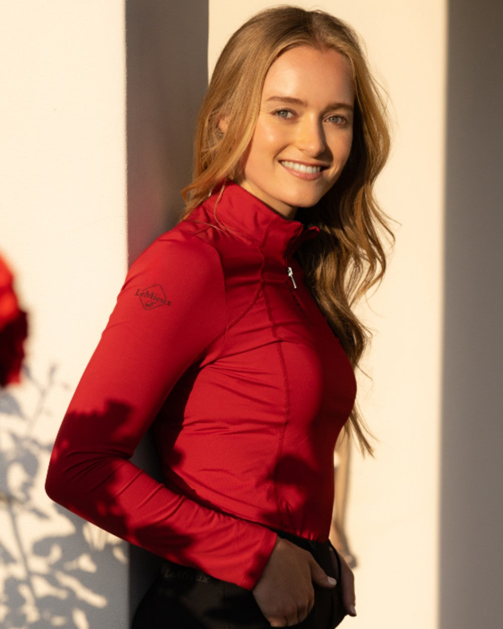 Chilli coloured LeMieux Womens Classique Base Layer on outdoor background