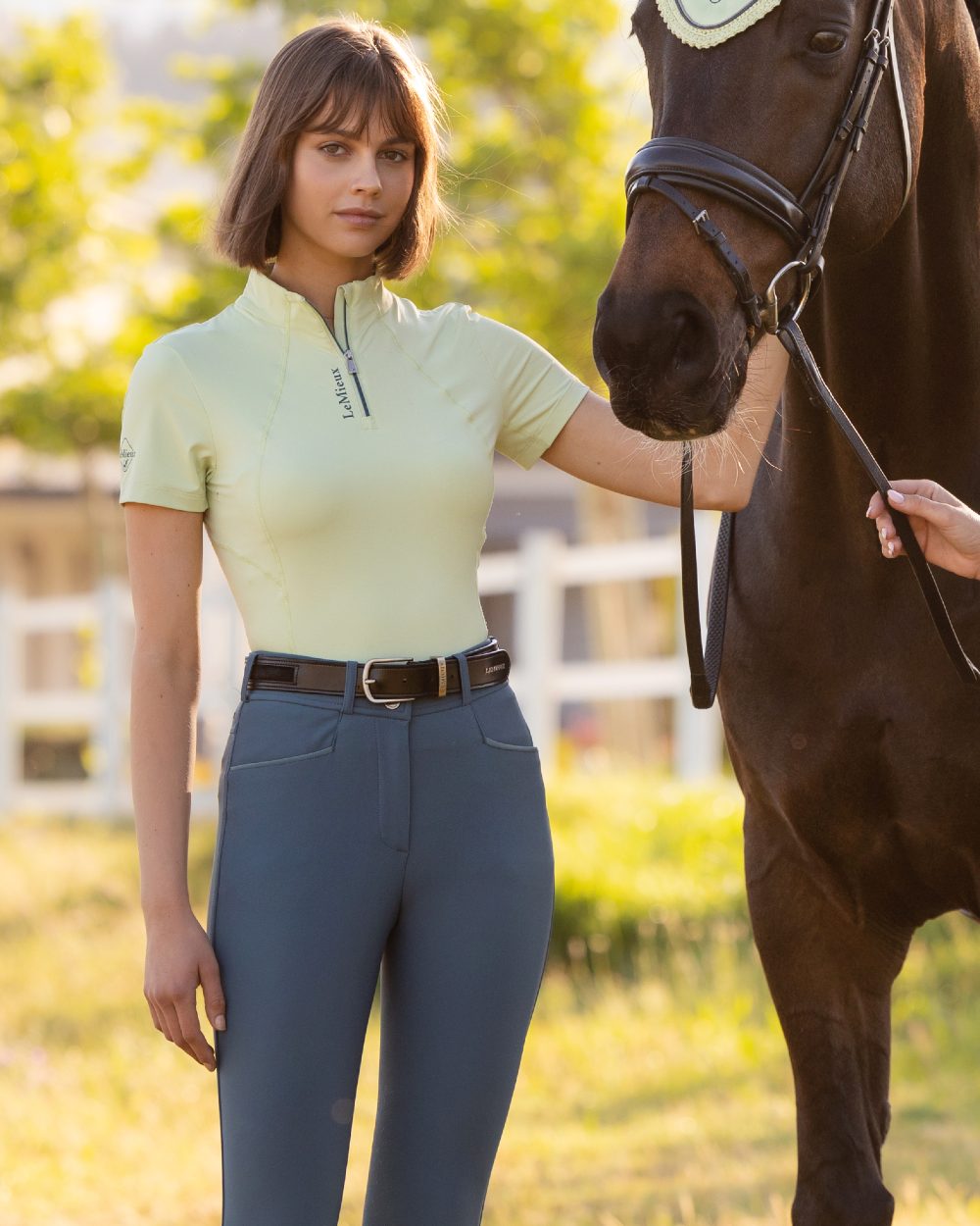 Macaron coloured LeMieux Womens Classique Short Sleeve Base Layer outdoor background