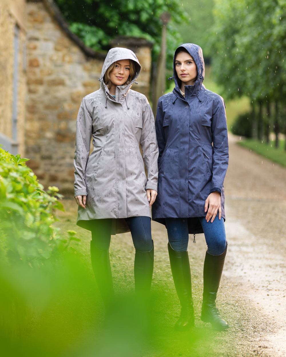 Pecan coloured LeMieux Womens Grace Long Rain Jacket on street background