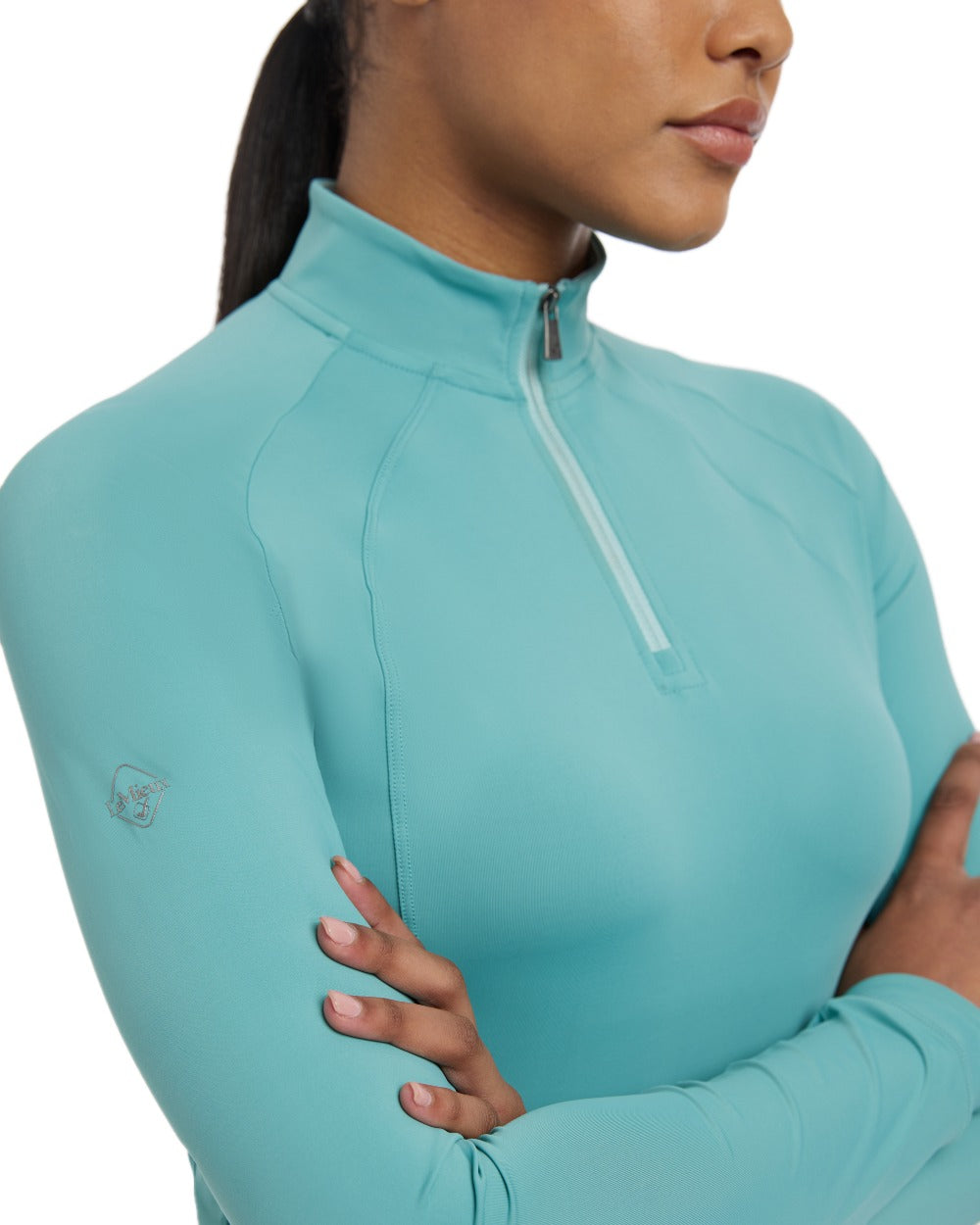 Lagoon coloured LeMieux Womens Halle Lightweight Base Layer on white background
