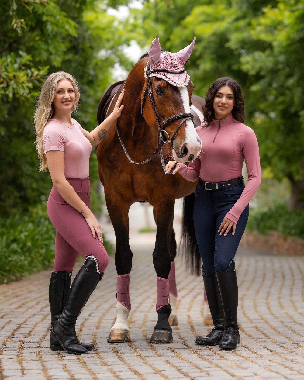 Peony coloured LeMieux Womens Halle Lightweight Base Layer on street background