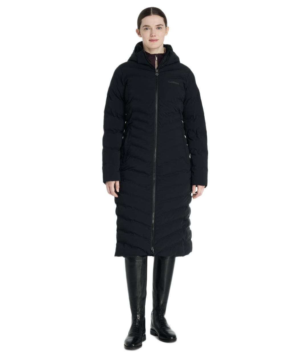 Black coloured LeMieux Womens Hayley Water Resistant Longline Puffer Coat on white background