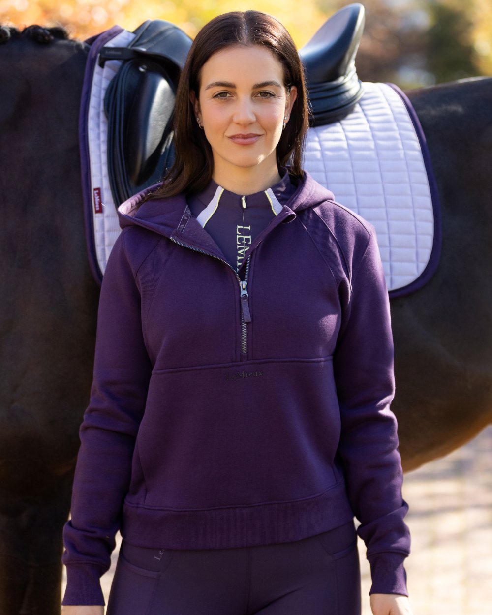 Juniper coloured LeMieux Womens Henrietta Half Zip Hoodie on blurry background