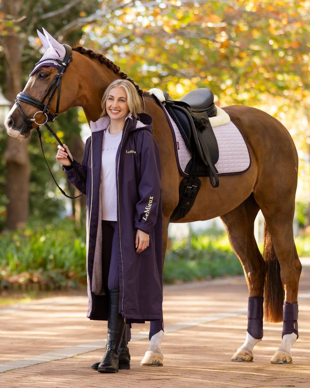 Juniper coloured LeMieux Womens HydroShield Robe Long Coat on tree background