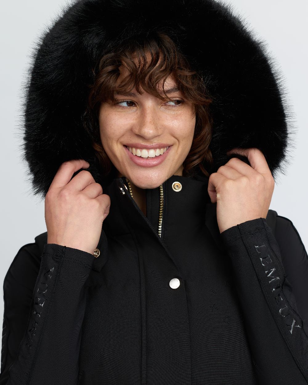 Black Coloured LeMieux Womens Margot Hooded Gilet on White Background