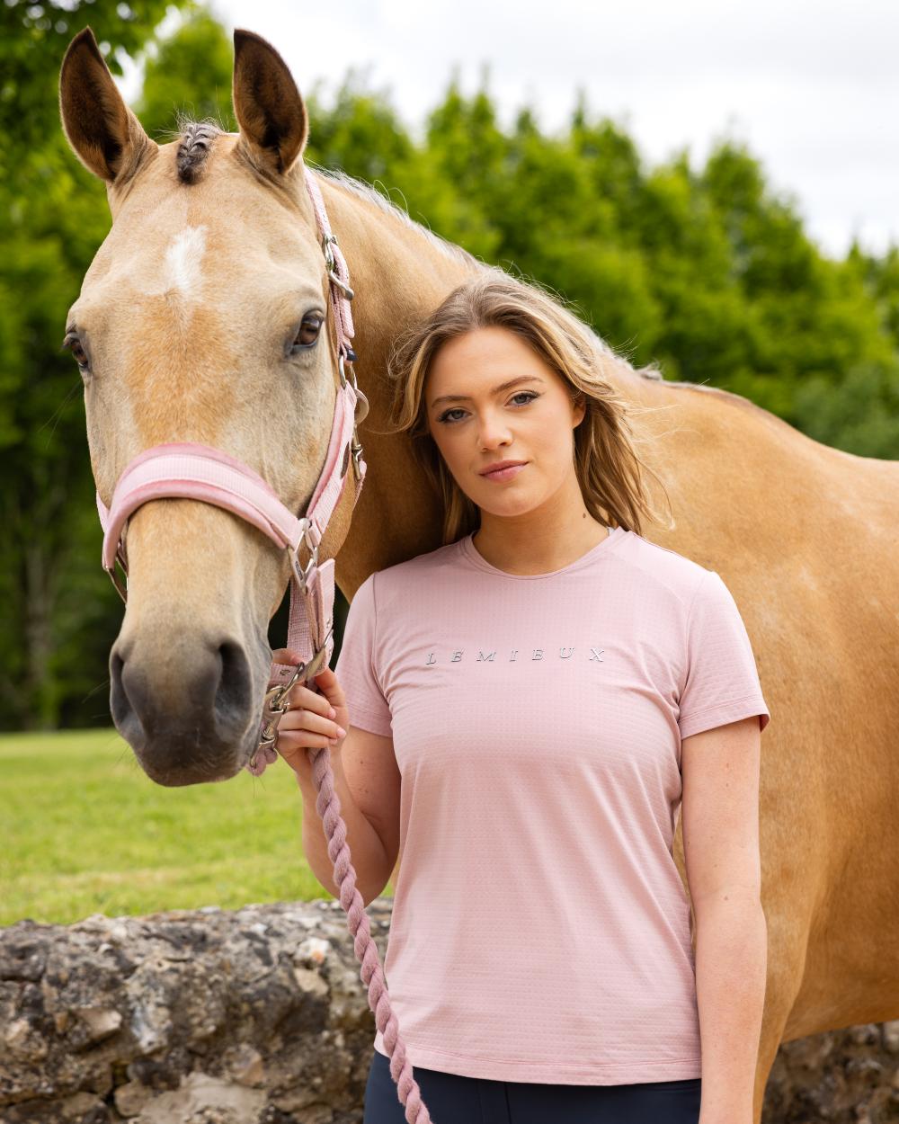 Blossom coloured LeMieux Womens Sports T-Shirt on backyard background