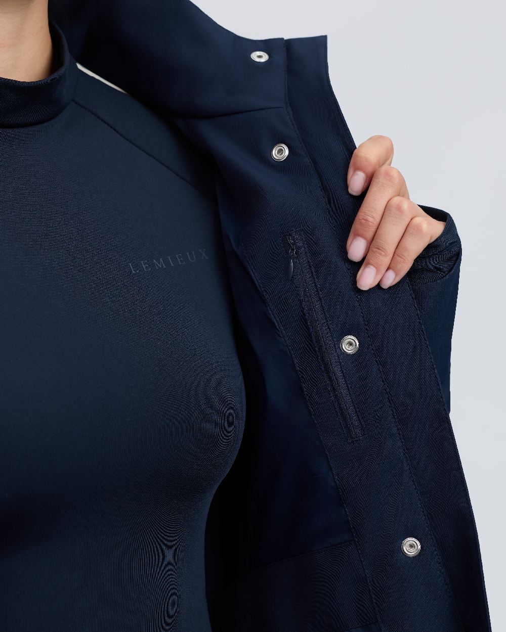 Navy Coloured LeMieux Womens Stormwear Performance Riding Coat on White Background