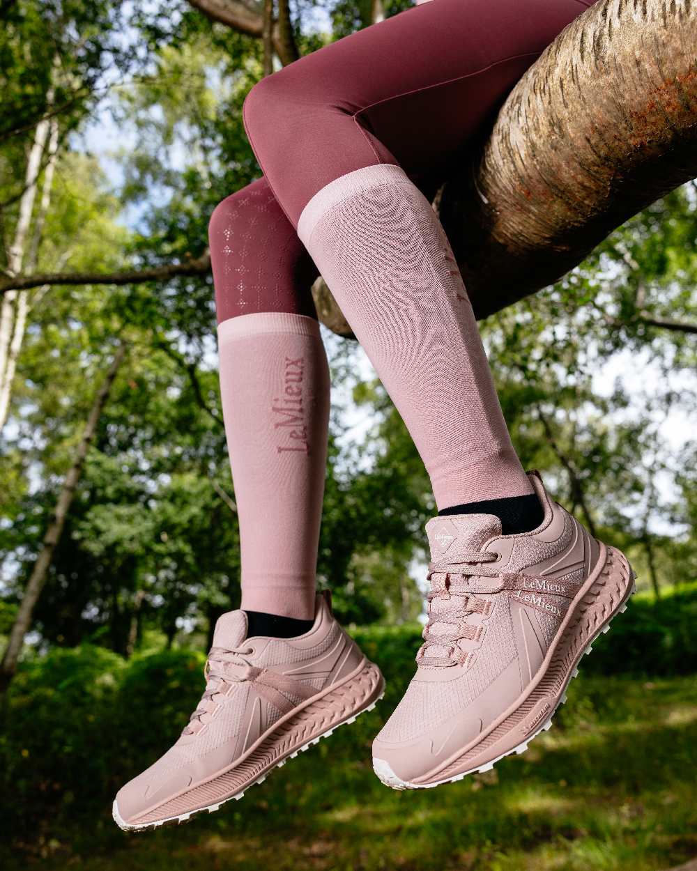 Blossom Coloured LeMieux Womens Trax Viva Waterproof Trainer Shoes on outdoor background