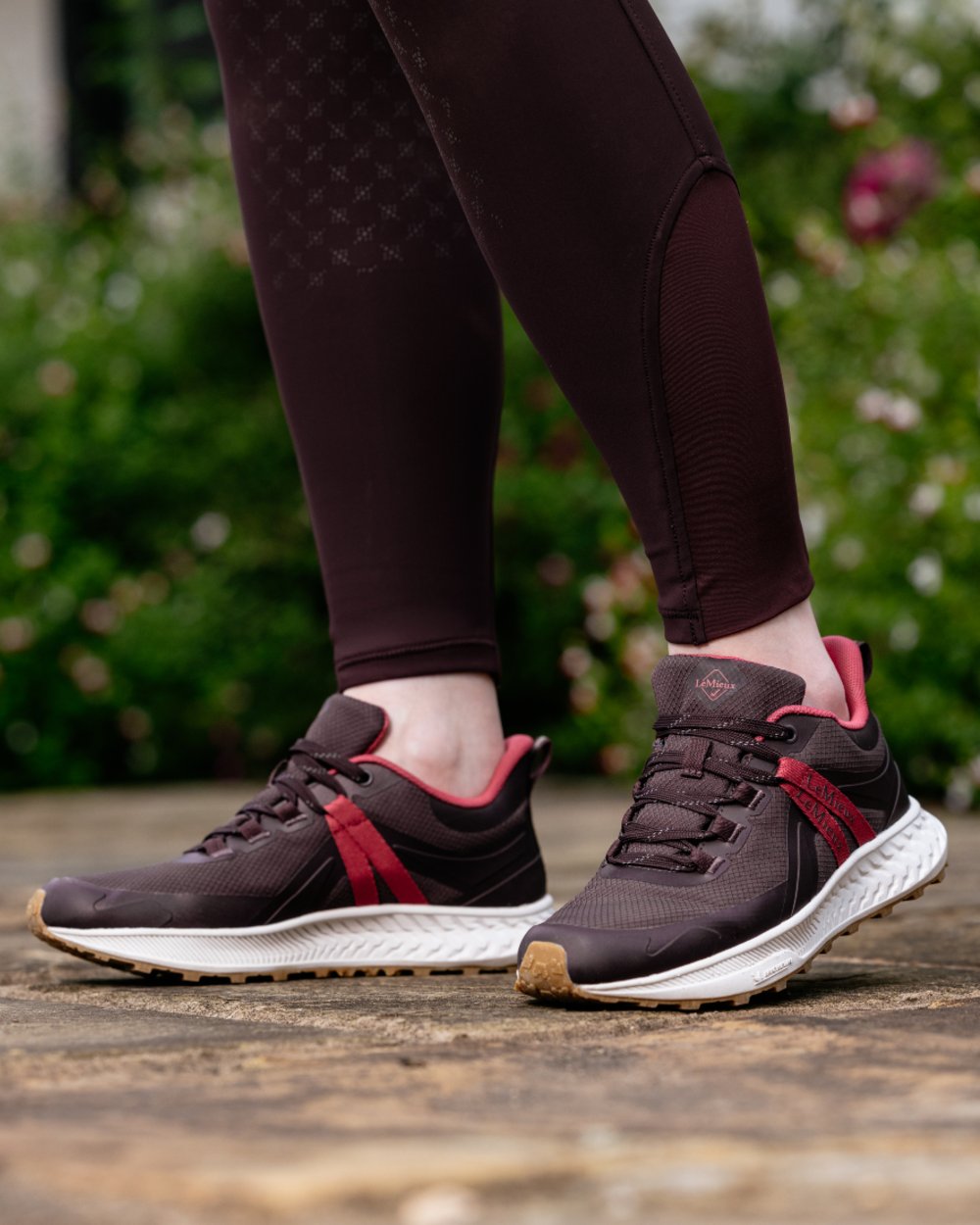 Damson Coloured LeMieux Womens Trax Viva Waterproof Trainer Shoes on outdoor background