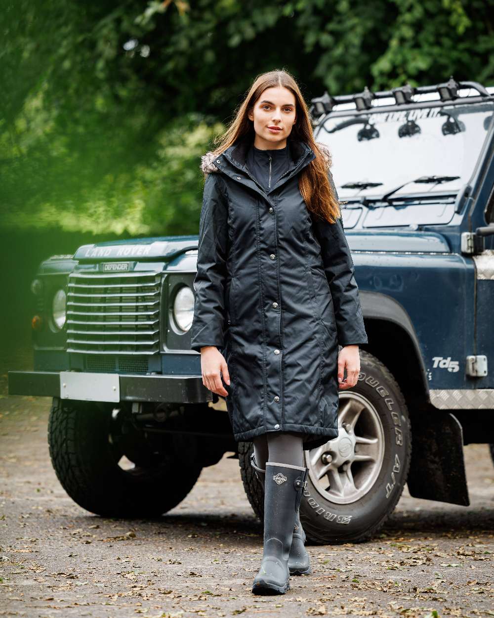 Navy Coloured LeMieux Womens Ultra Stride Wellington Boots on car background