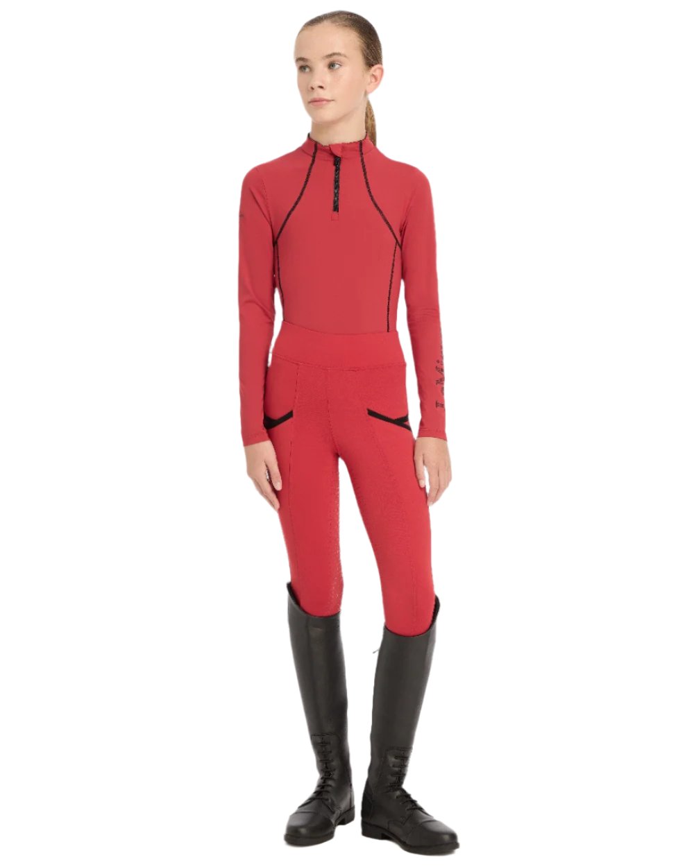 Chilli coloured LeMieux Young Rider Base Layer on white background