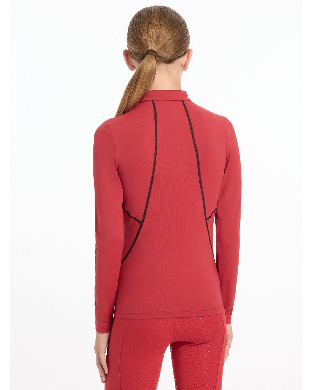 Chilli coloured LeMieux Young Rider Base Layer on white background