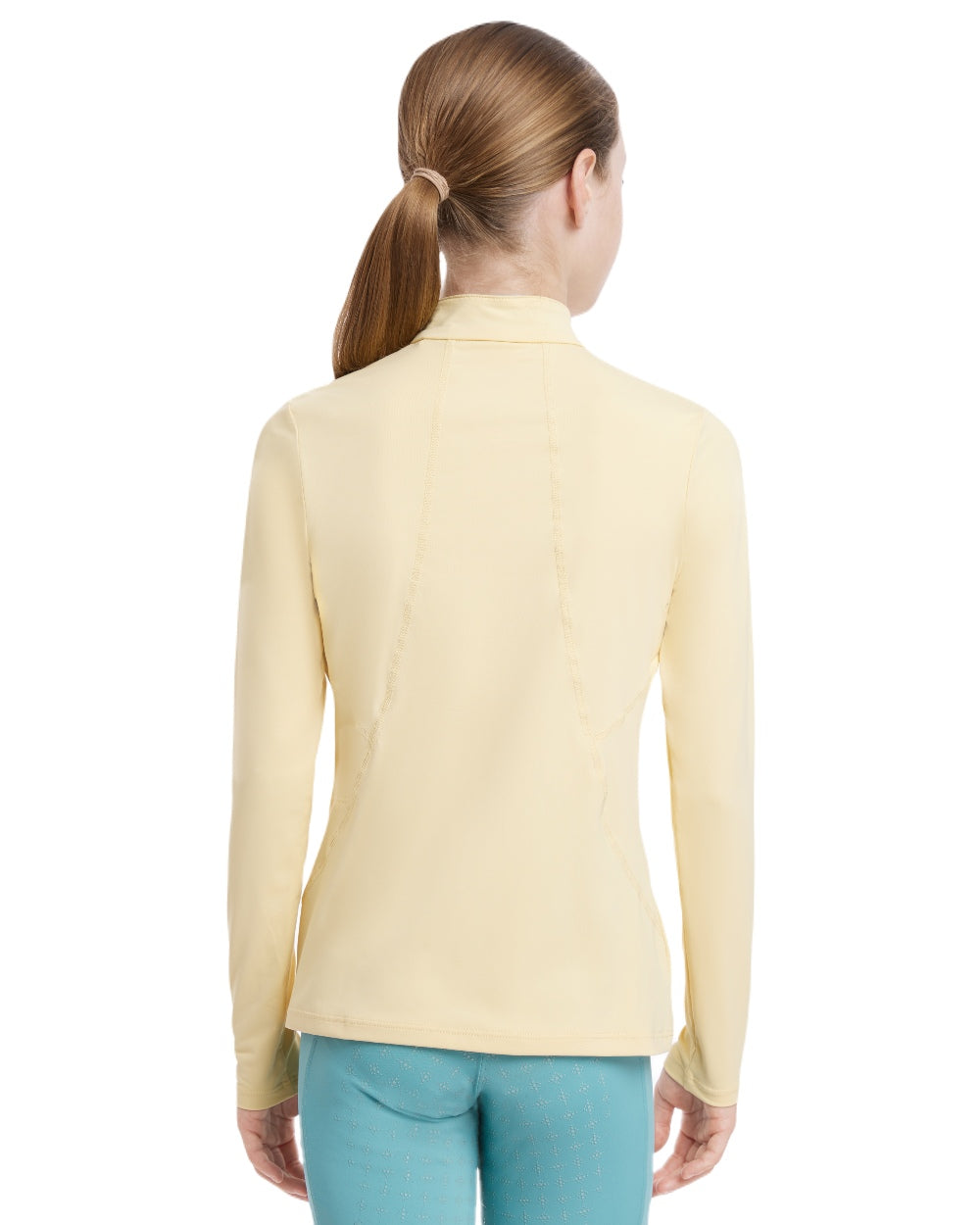 Mimosa coloured LeMieux Young Rider Base Layer on white background