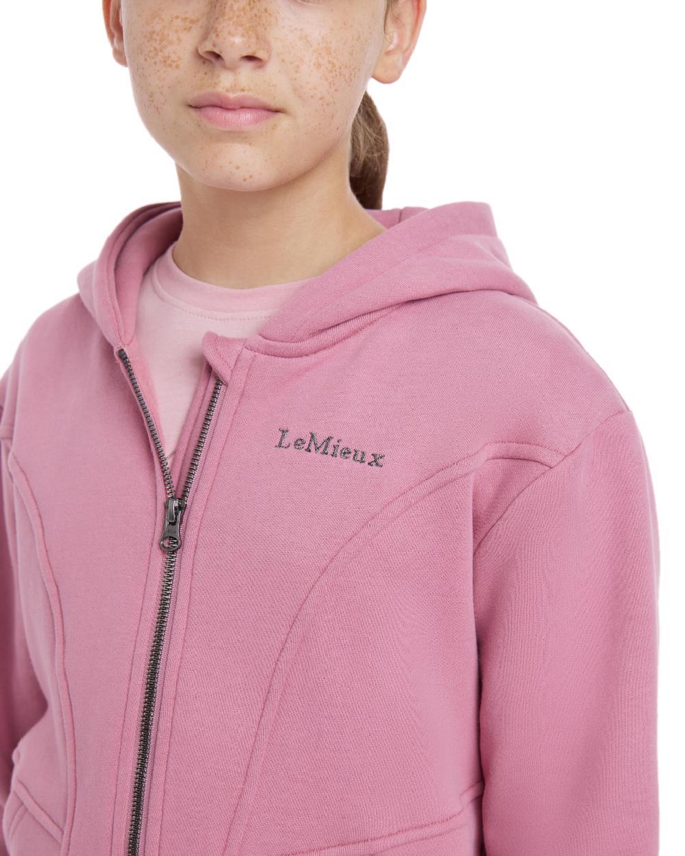Peony coloured LeMieux Young Rider Hadley Hoodie on white background