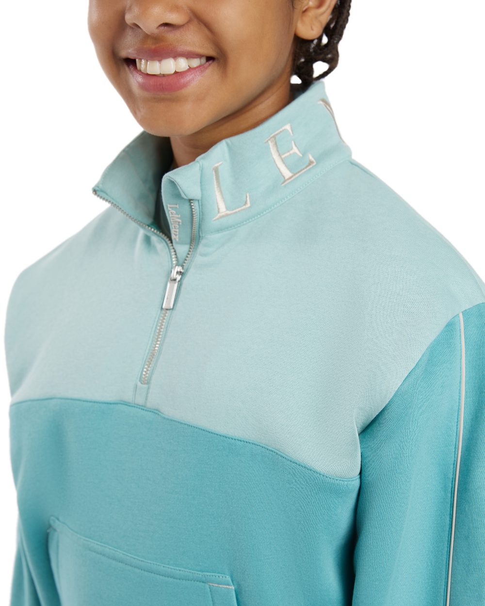 Lagoon coloured LeMieux Young Rider Kate Quarter Zip Sweater on white background