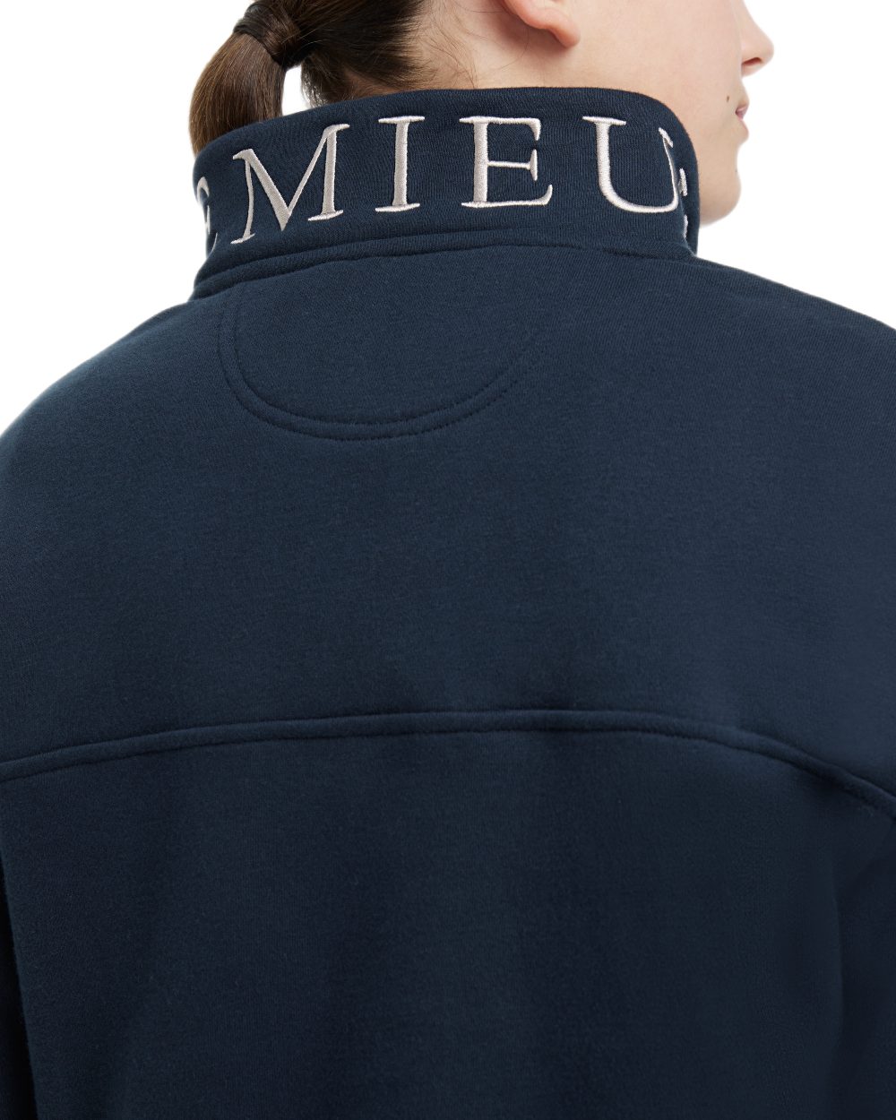 Navy coloured LeMieux Young Rider Kate Quarter Zip Sweater on white background