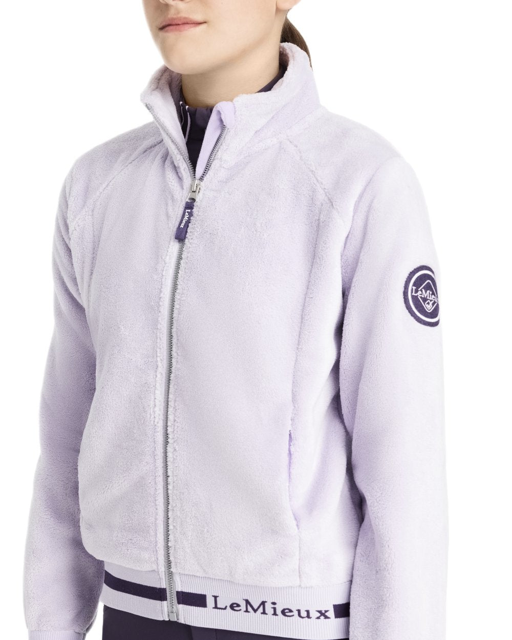 Lilac Coloured LeMieux Young Rider Libby Fleece Jacket On A White Background