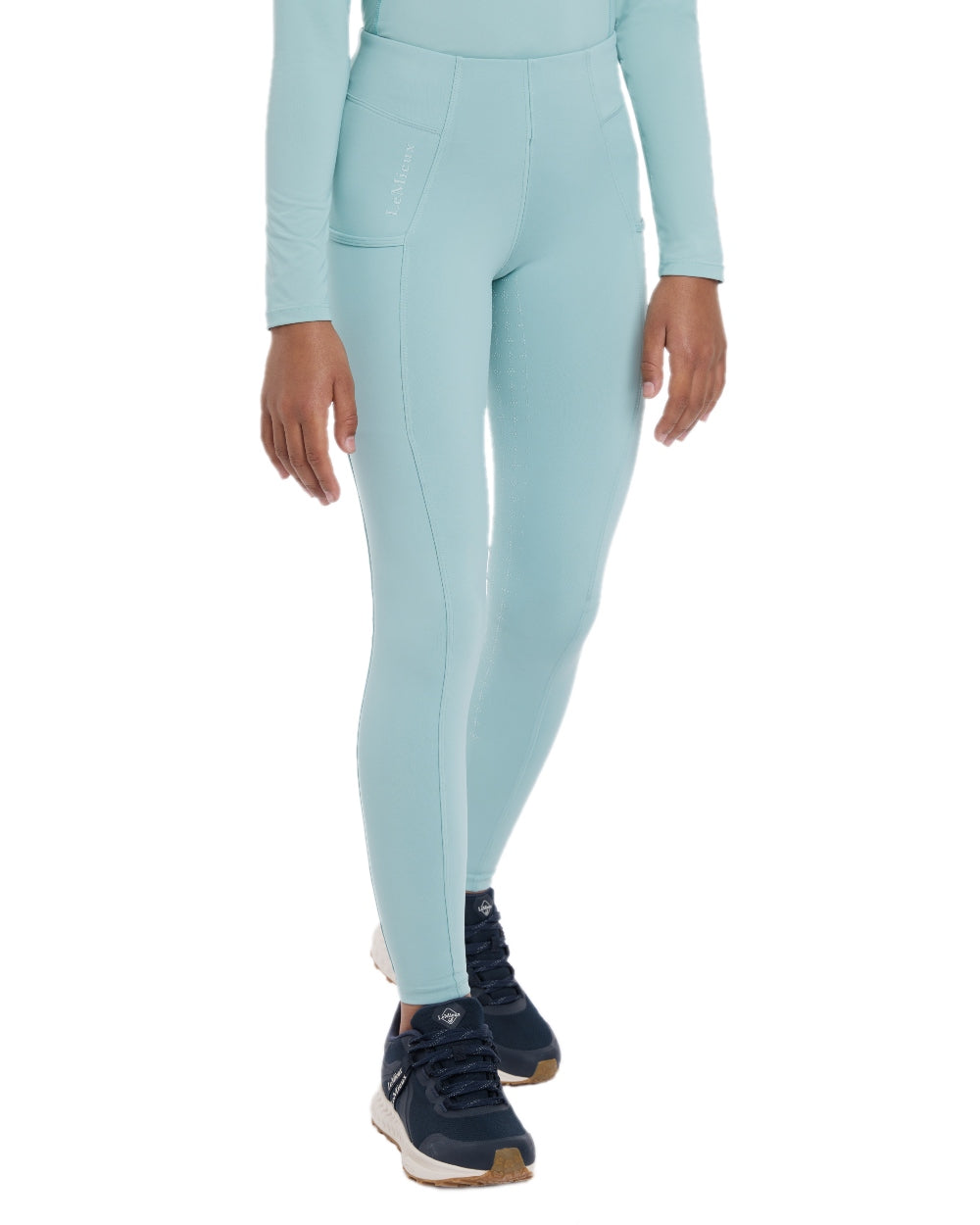 Aqua coloured LeMieux Young Rider Orla Pull Ons on white background