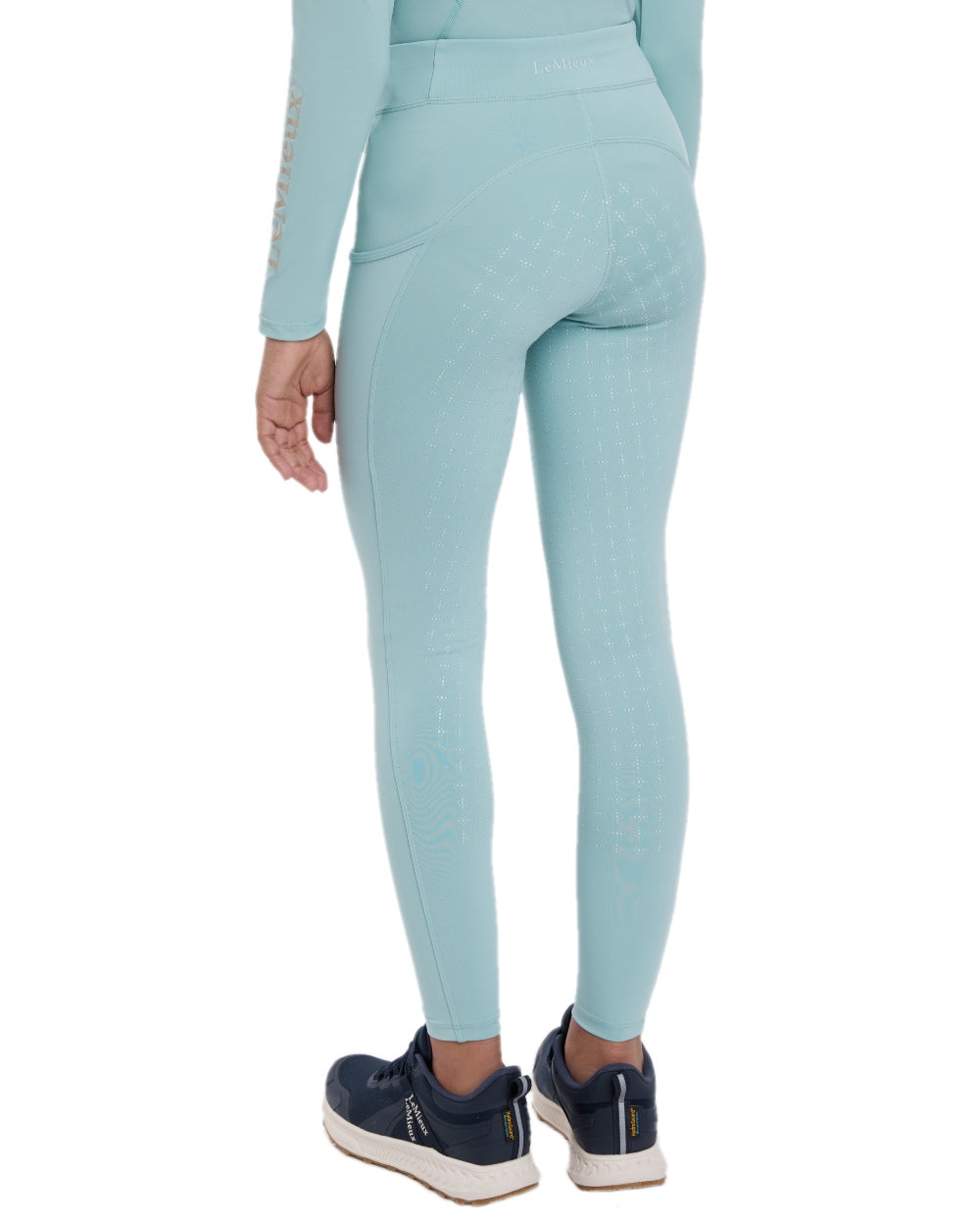 Aqua coloured LeMieux Young Rider Orla Pull Ons on white background