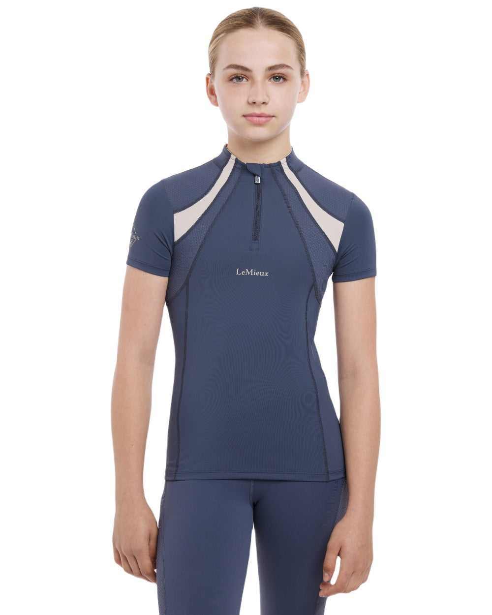 Dusk Blue coloured LeMieux Young Rider Short Sleeve Mia Mesh Base Layer on white background
