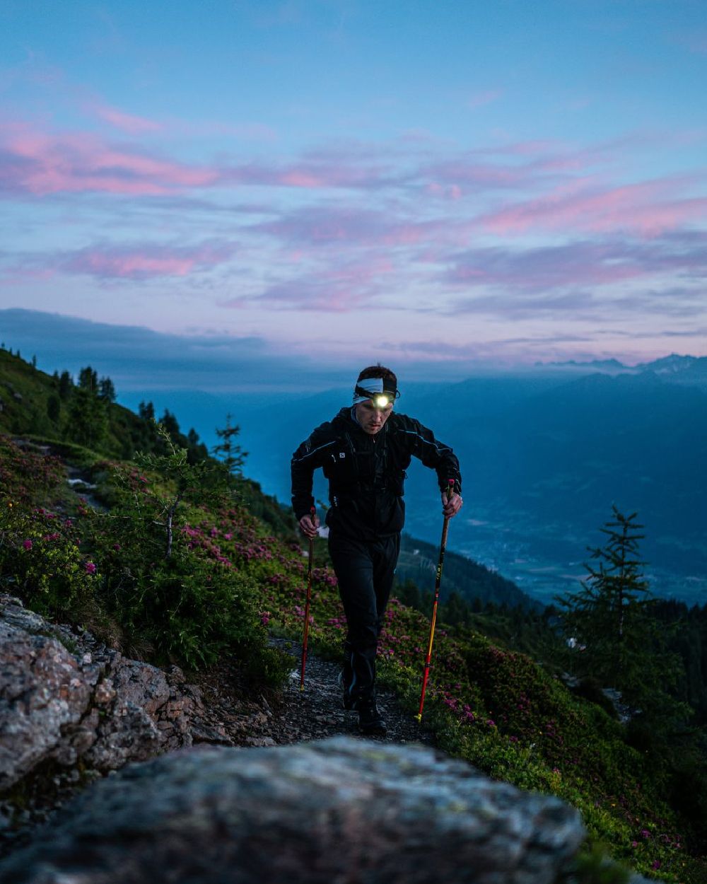 Black Coloured Led Lenser H7R Core Head Torch on mountain background