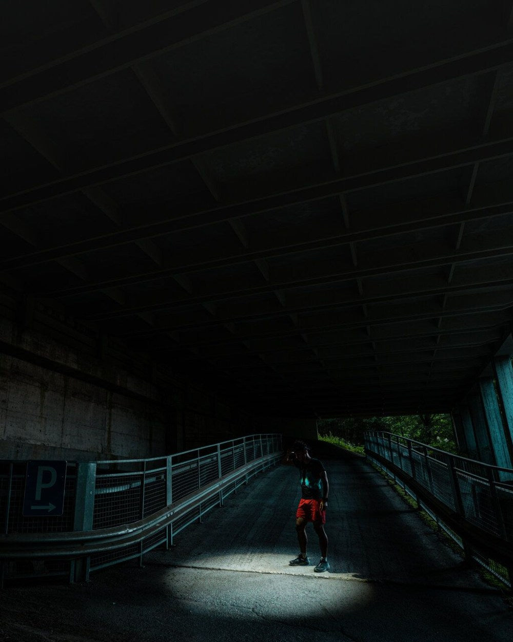 Black Coloured Led Lenser H7R Signature Rechargeable Head Torch on street background
