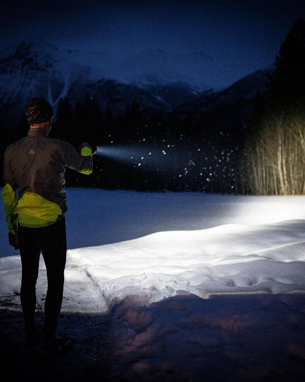 Espresso Brown Coloured Led Lenser P18R Signature Rechargeable Torch on snow background