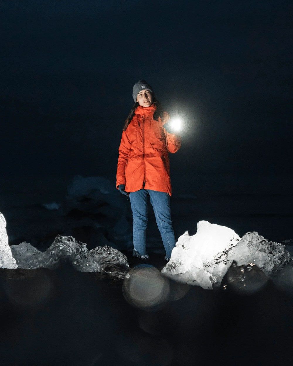 Espresso Brown Coloured Led Lenser P18R Signature Rechargeable Torch on blurry background